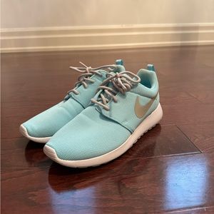 Tiffany blue Nike Roshe women’s running shoes.